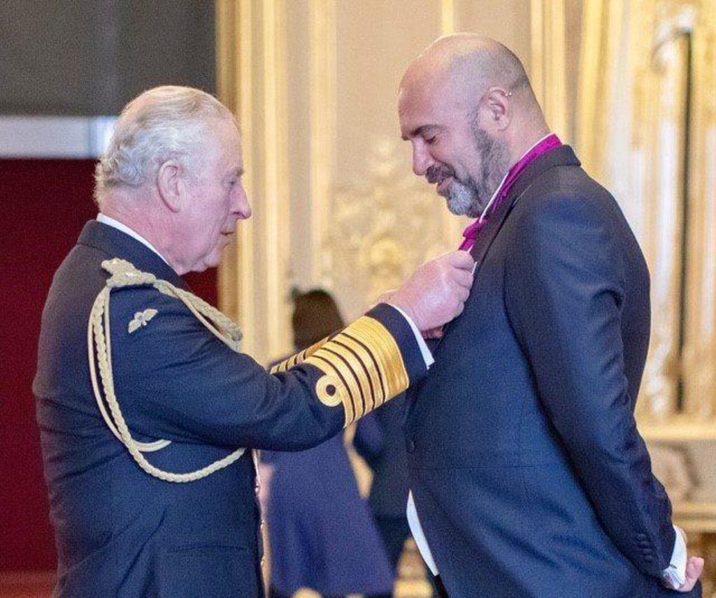 Marc Abraham getting his OBE from King Charles, this shows how much he wanted to become a veterinarian